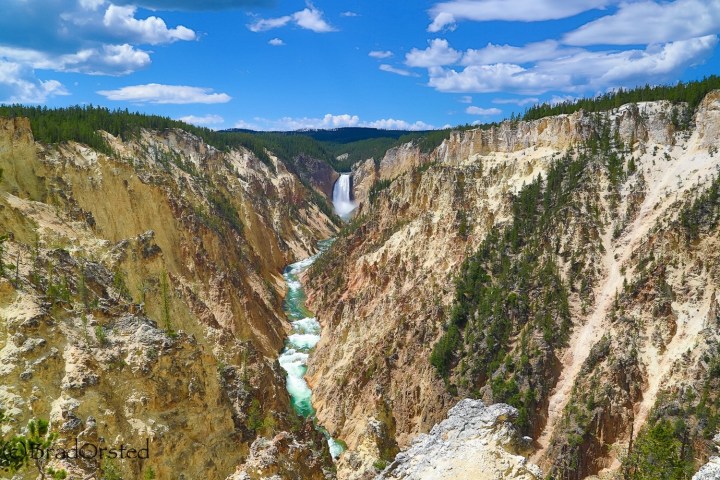 a canyon with a mountain in the background