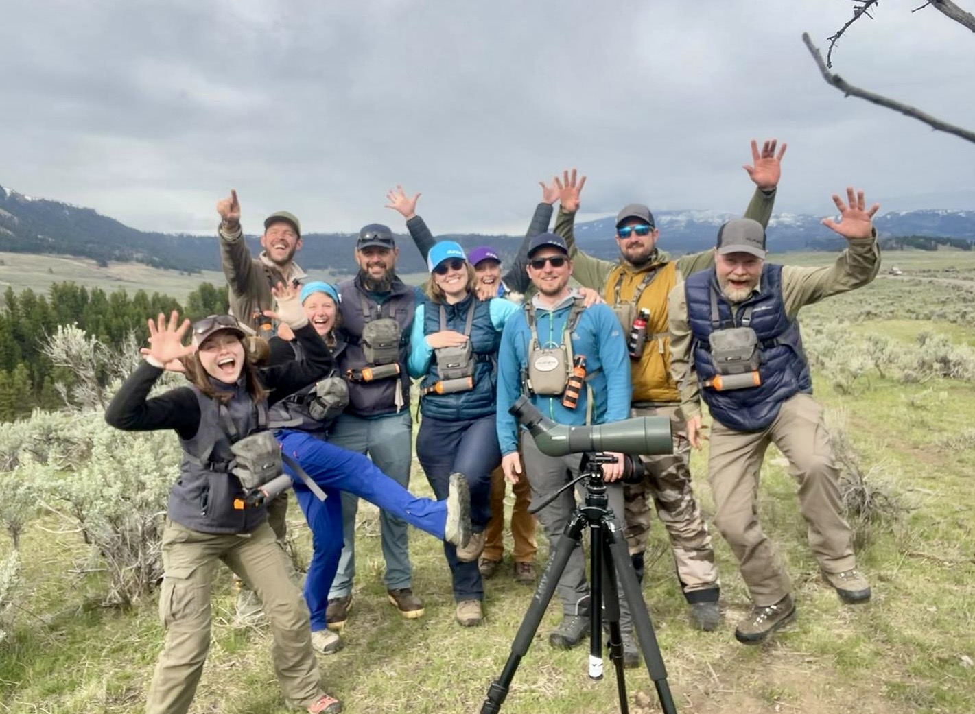 a group of people posing for the camera